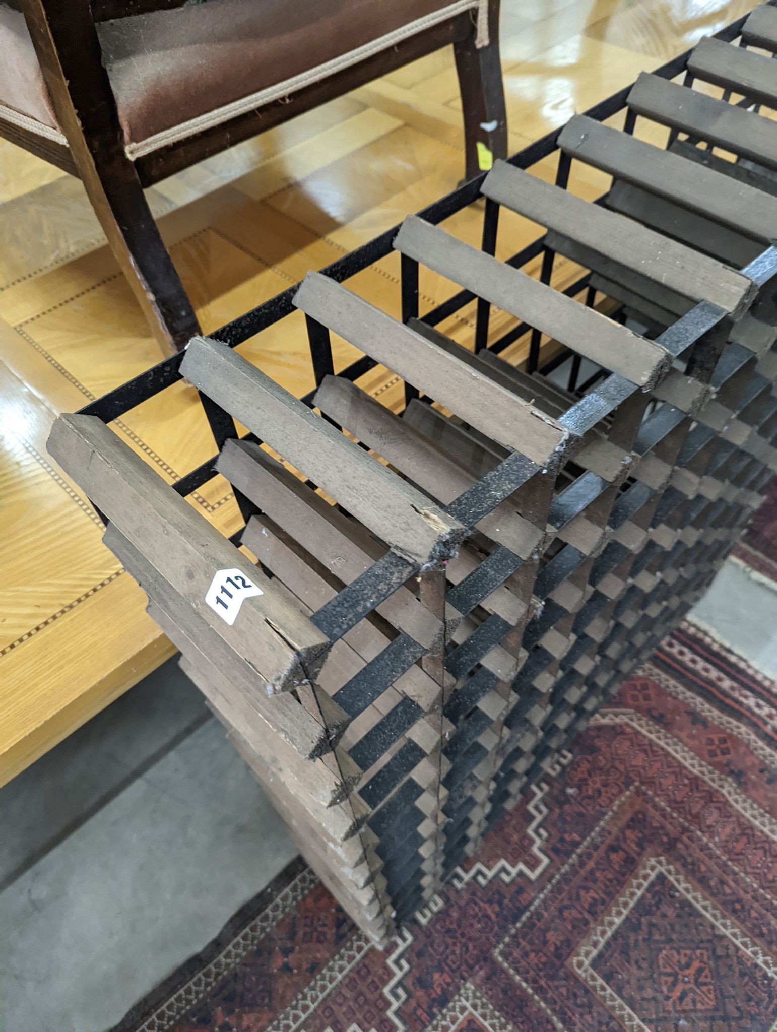 A 99 bottle wine rack, width 90cm
